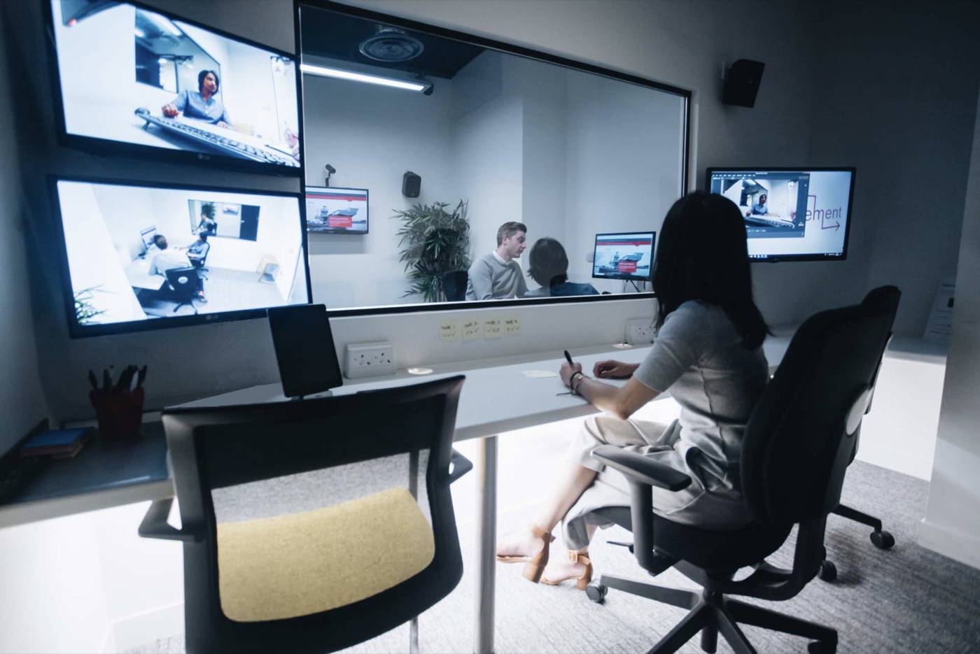 A moderated user testing lab with an observation room