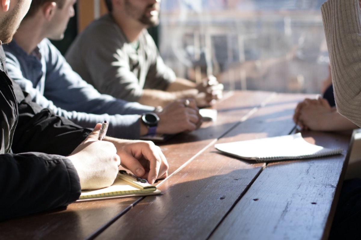 People around a table in a focus group