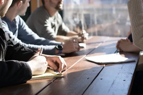 People around a table in a focus group