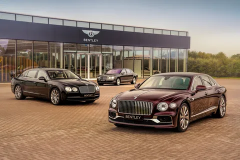 Bentley Flying Spurs parked outside the Bentley building at the company's headquarters in Crewe.