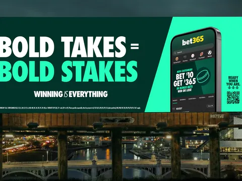 A bet365 billboard reading Bold takes = bold stakes, with a phone showing a sign-up offer.